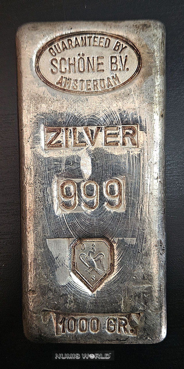 NL, SCHÖNE B.V. Amsterdam, Ovalstempel: Guaranteed by..., ZILVER 999, älteres Schöne-Logo, 1 Kilo, Abmessung: 115 x 51 x 15 mm, einseitig geprägt, Erstarrungslinien, Patina, differenzbesteuert, vz+  